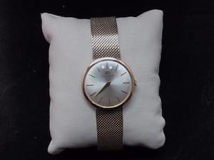 VINTAGE UNISEX MOVADO 18-KARAT SOLID YELLOW GOLD TIME PIECE