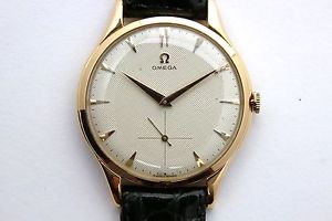 Vintage genuine OMEGA men's 18K gold watch fully revised