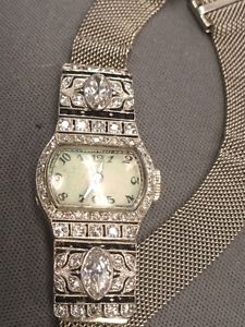 Vintage Lds Hamilton 1.75cttw Dia and onxy watch 17jewel plat case/14k band