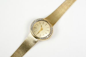 Elegante Damenuhr 585 Gelbgold, mit Diamanten. Sehr wenig getragen. Mech. Werk.