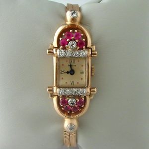 Estate .25 CT Diamond Rubies Bulova Ladies 14k rose gold Watch
