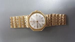 VINTAGE 14k GOLD BAUM & MERCIER GENEVE SWISS MADE MANUAL WIND WATCH