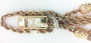 14 KARAT YELLOW GOLD 17JEWEL CANOE WATCH WITH DIAMONDS PINEAPPLE TASSELS UNIQUE!