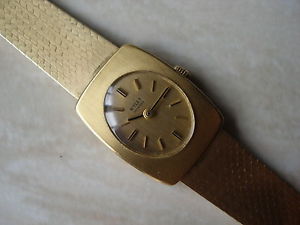 LADYS 18 CARAT GOLD WYLER WRIST WATCH WITH AN INTEGRAL BRACELET