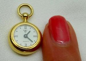 Guinness world record-the SMALLEST 18k gold vintage pocket watch c1980. 12mm!