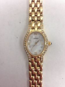 Movado 14k With MOP Dial And Diamond Bezel