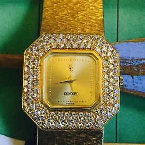 Concord 18K Yellow Gold Watch Diamond Bezel total weight=60.3 gms band=5 1/2"