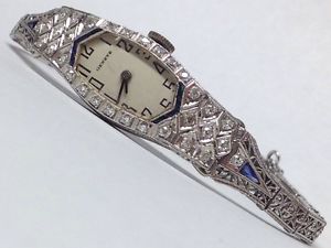 PLATINUM AND 14K WHITE GOLD DIAMONDS AND SAPPHIRES GENEVE WRIST WATCH