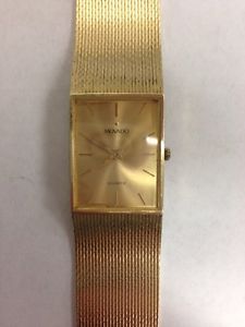 Movado 14k Yellow Gold B56