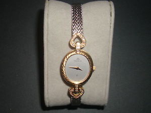 Milus Damenuhr Gold 750 Luxusuhr mit 28 Dia. ca. 0,30 ct