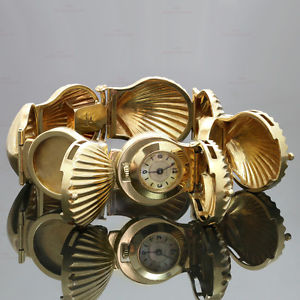 J. SCHULZ Diamond Ruby 14k Yellow Gold Seashell Bracelet Locket Watch Circa 1925