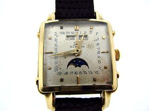 GUBELIN 18K YELLOW GOLD TRIPLE DATE MOON FACE VINTAGE WATCH