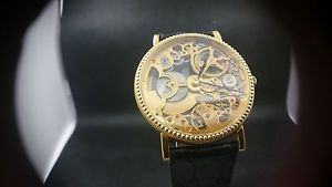 ULTRA THIN UNIVERSAL GENEVE - FINE 18K GOLD SKELETONIZED AUTOMATIC WRISTWATCH