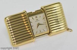 Reiseuhr Golduhr Uhr in 750 Gold Handaufzug Movado Herrenuhr Markenuhr Uhren