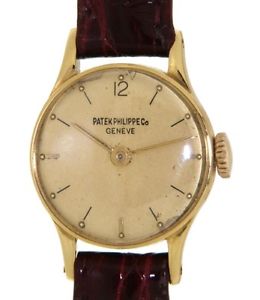 LADY 1289 IN YELLOW GOLD AND LEATHER, 21MM