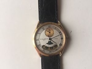 BAUME ET MERCIER  MOONWATCH UNISEX  18k SOLID GOLD MINT CONDITIONS