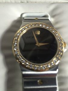 MOVADO QUARTZ WATCHES with 18k gold face and STONE DIAMOND.