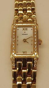 WOMEN MOVADO WATCH SOLID 14K GOLD AUTHENTIC MOTHER OF PEARL BEZEL 30 DIAMONDS