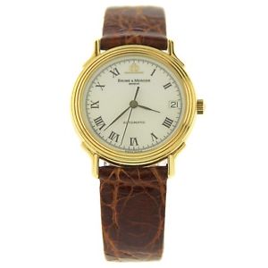 BAUME AND MERCIER 18K GOLD AND LEATHER AUTOMATIC WATCH