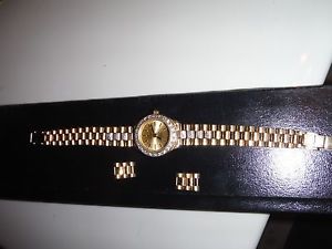 LADIES VICENCE 14K GOLD WATCH,SWISS MOVEMENT, KITSINIAN ITALY.30.7 GRAMS RARE.