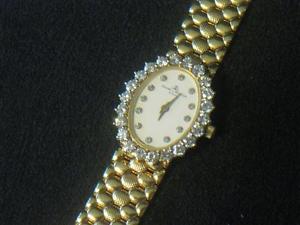 BAUME AND MERCIER GENEVE 18K YELLOW GOLD AND DIAMOND LADIES WRIST WATCH