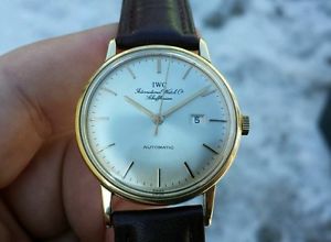 Vintage IWC SCHAFFHAUSEN , automatic with date - solid gold 14k, C 8531