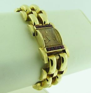 Vintage Concord solid 14 K gold and Ruby Quartz watch
