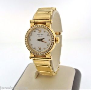 Movado Vizio 18kt yellow gold diamond ladies watch. 105gm