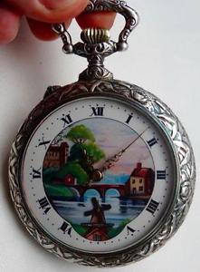 Rare antique giant fancy silvered chased case Dutch Mill Automaton pocket watch.