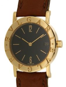 BVLGARI IN YELLOW GOLD AND LEATHER, 30MM