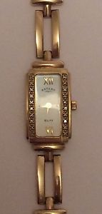 ROTARY Ladies 9ct Gold Watch. Diamond Set Case