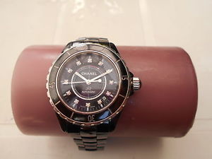 Montre femme Chanel J12 Ceramique index diamants cadran noir 38 mm automatique