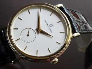 AUTHENTIC  MEN  UNIVERSAL GENEVE  SOLID  18K  GOLD CASE  MANUAL WINDING  NOS