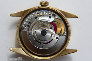 ROLEX DAY-DATE original cal. 1556 movement in a gold 18K. custom case & bracelet