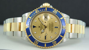ROLEX - 18kt Gold & SS SUBMARINER Champagne Serti Inner Bezel - 16613 SANT BLANC