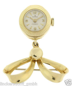 CARL BUCHERER MINIATURUHR MIT ANSTECKANHÄNGER IN 18ct GELBGOLD - ca. 70er JAHRE