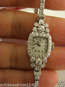 STUNNING VINTAGE MOVADO PLATINUM & 2.75 TCW DIAMONDS 17J WOMEN'S WATCH.