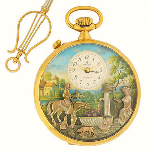 Reuge Gold Plated Open Face Pocket Watch w/ Scenic Background & Key circa 1980