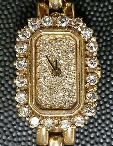 AN EXCLUSIVE DESIGN BY BERNHARD MAYER 14KT GOLD DIAMOND DIAL&BEZEL WATCH