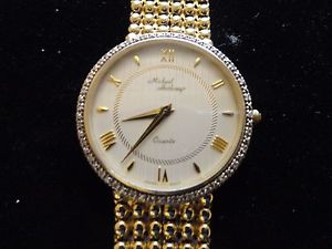 MICHAEL ANTHONY LADIES 14 KT  YELLOW GOLD DIAMOND SWISS QUARTZ WATCH