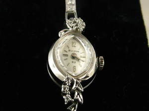 Bulova 23 jewel wrist watch is 14kt White gold w/33 Diamonds of .76ct