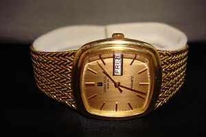 UNIVERSAL GENEVE 18K SOLID GOLD WATCH