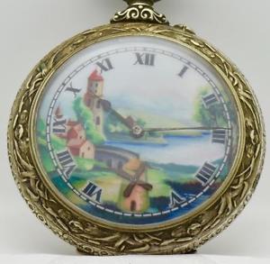 Rare antique giant fancy silvered chased case Dutch Mill Automaton Doxa watch.