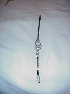 FABULOUS 14K WHITE GOLD WATCH AND BAND WITH DIAMONDS ON WATCH AND BAND