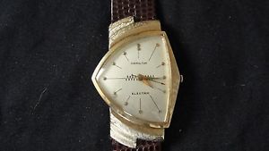 HAMILTON ELECTRIC VENTURA 505 MEN'S WRIST WATCH, 14K GOLD ASYMMETRICAL CASE