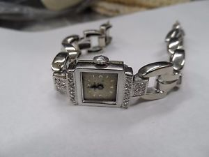 ladies vintage chalet solid 14kt white  gold 17j wind mvt watch 38grams 16diams