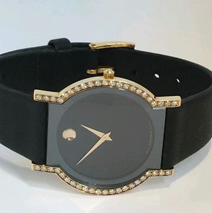 Movado 18k Horizon Watch with diamond bezel.