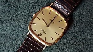 Mens 18kt solid gold Cellini dress watch