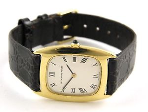 AUDEMARS PIGUET 750 / 18 KARAT GOLD ARMBAND UHR MIT HANDAUFZUG