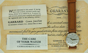 Gents Solid 9ct Yellow Gold Vintage Garrard Watch with Original Box and Papers